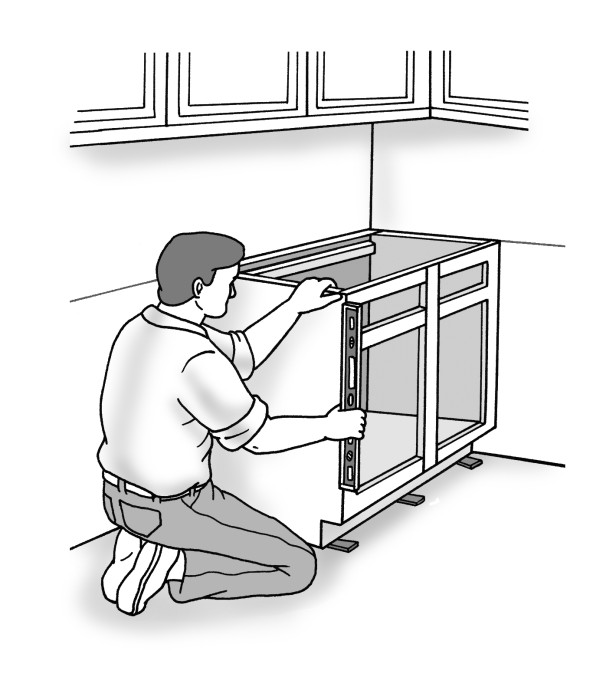 Figure 2-7: Use shims as needed to level the blind base cabinet.